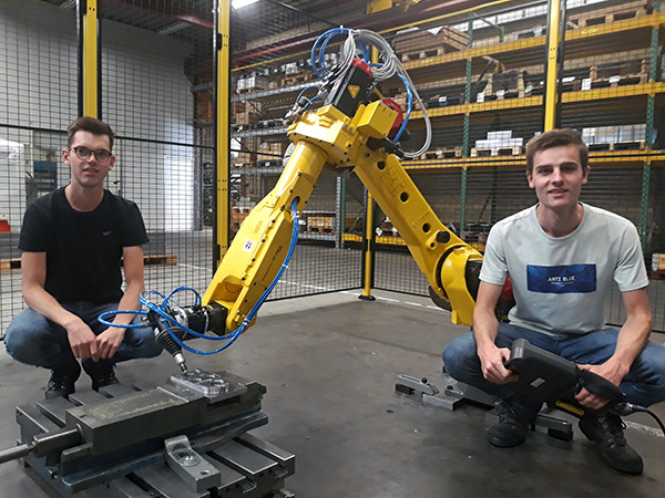 Deburring robot for truck front axles